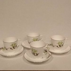 Set of 4 teacups and saucers